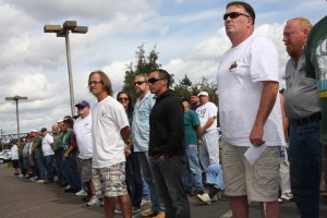  On Sept. 30, Leighton imposed the $250,000 fine, which was about $42,000 less than EGT and the NLRB had requested. Above, Local 21 members stand outside the Cowlitz County Hall of Justice on Sept. 26 offering peaceful surrender on any warrants for the demonstration on Sept. 7. Photo by Dawn Des Brisay